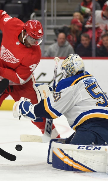 Blues beat Red Wings in OT after blowing lead